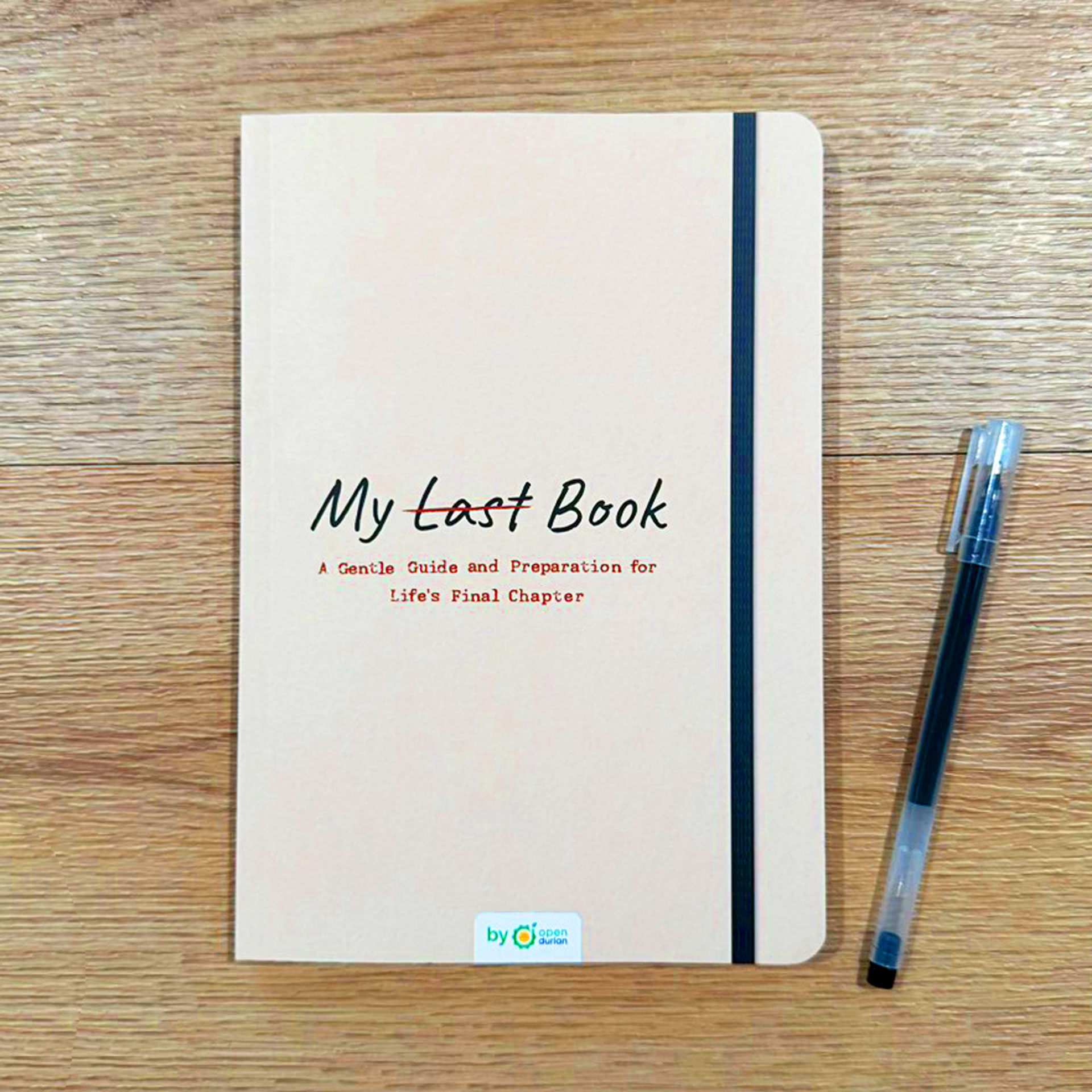 Cover of "My Last Book" by OpenDurian, shown with a pen next to it.