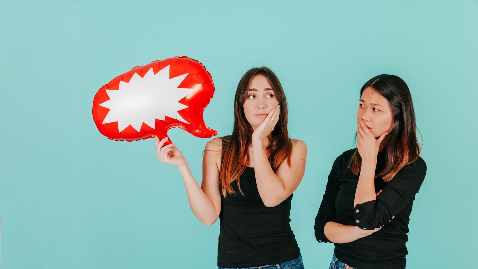 Two women thinking about conversation.